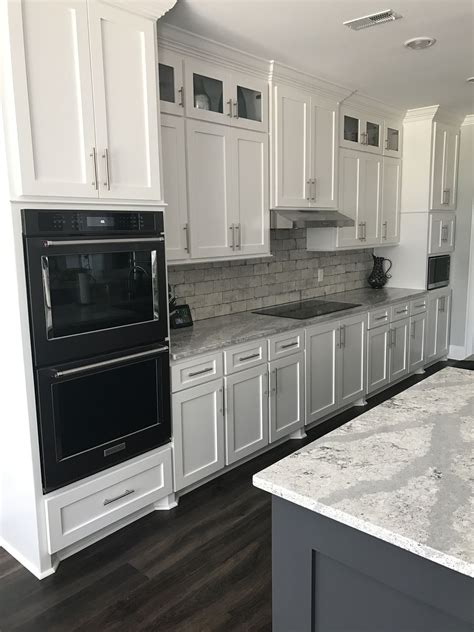 white cabinets with black stainless steel|white kitchen cabinets with black countertops.